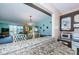 Kitchen pass-through provides views of the living room and balcony with waterfront views at 7405 Bay Island S Dr # 220, South Pasadena, FL 33707