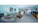 Comfortable living room featuring cozy furniture and ample natural light, creating a relaxing atmosphere at 7405 Bay Island S Dr # 220, South Pasadena, FL 33707