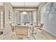Bright breakfast nook with natural light, comfortable seating, and a serene ambiance at 7435 Woodhollow Rd, Spring Hill, FL 34606