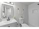 Modern bathroom featuring a sleek vanity, decorative textured walls, and a luxurious shower at 7480 Hobson Ne St, St Petersburg, FL 33702