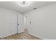 Bright bedroom with luxury vinyl flooring and closet at 7480 Hobson Ne St, St Petersburg, FL 33702