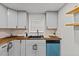 Bright kitchen with modern appliances and window over the sink at 7480 Hobson Ne St, St Petersburg, FL 33702
