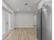 Spacious living room with patio door and stainless steel appliances at 7480 Hobson Ne St, St Petersburg, FL 33702