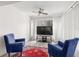 Cozy living room featuring comfortable seating, a ceiling fan, and bright light at 7703 Rockville Ct # 0, New Port Richey, FL 34654