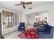 Inviting living room showcasing ample seating, bright light, and an open layout at 7703 Rockville Ct # 0, New Port Richey, FL 34654