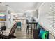 Modern kitchen featuring white appliances, lots of counter space, and an eat-in dining area with bench seating at 7825 38Th N Ter # 7825, St Petersburg, FL 33709