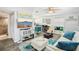 Comfortable living area with seamless flow to the modern kitchen, perfect for entertaining and everyday living at 7825 38Th N Ter # 7825, St Petersburg, FL 33709
