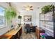 Office with a ceiling fan, a window, an office chair, and plenty of storage space at 7825 38Th N Ter # 7825, St Petersburg, FL 33709