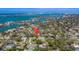 View pinpoints property in a community with bridge views, lush landscaping, and waterfront at 809 Royal Dr, Largo, FL 33770