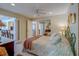 Open view of the bedroom with a queen bed, and glimpses into other rooms at 809 Royal Dr, Largo, FL 33770