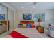 Bedroom highlighting a bed with decorative pillows, a ceiling fan, and a sliding door closet at 809 Royal Dr, Largo, FL 33770