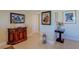 Foyer with wooden furniture and decorations, and artwork at 809 Royal Dr, Largo, FL 33770