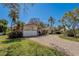 Charming home with paver driveway, well-maintained lawn, mature trees and desirable curb appeal at 809 Royal Dr, Largo, FL 33770