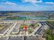 Aerial view of community with stunning lake views and nearby amenities at 8842 Turnstone Haven Pl, Tampa, FL 33619