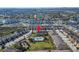 Aerial view of a multi-Gathering home with a community pool, playground, and lush landscaping in a Gathering-friendly neighborhood at 8842 Turnstone Haven Pl, Tampa, FL 33619