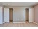 This bedroom features light colored floors and two closets with plenty of storage space at 8842 Turnstone Haven Pl, Tampa, FL 33619