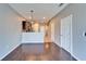 Spacious living room with an open floor plan and hardwood floors at 8842 Turnstone Haven Pl, Tampa, FL 33619