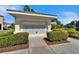 Exterior view of the community mailboxes with landscaping at 8842 Turnstone Haven Pl, Tampa, FL 33619