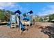 Community playground with slide, stairs, and climber at 8842 Turnstone Haven Pl, Tampa, FL 33619