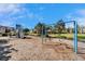 Community playground with swings and slide for outdoor fun at 8842 Turnstone Haven Pl, Tampa, FL 33619
