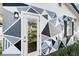 Exterior shot of the shed with modern geometric design and black window shutters at 907 Jones St, Clearwater, FL 33755