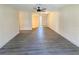 Open-concept living room with seamless flow and contemporary design at 9221 Repondo Pl, New Port Richey, FL 34655