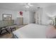 Cozy bedroom with natural light, neutral tones, and ample space for relaxation at 9718 Tiffany Oaks Ln # 12, Tampa, FL 33612
