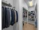 Dual closets with organized storage racks and rods, perfect for ample clothing and accessories at 9718 Tiffany Oaks Ln # 12, Tampa, FL 33612