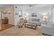 Cozy living room featuring comfortable seating, natural light, and a decorative art piece at 9718 Tiffany Oaks Ln # 12, Tampa, FL 33612