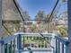 Enclosed patio with beautiful view of landscaped backyard and surrounding neighborhood at 9718 Tiffany Oaks Ln # 12, Tampa, FL 33612