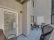 Enclosed outdoor patio with table and chairs, providing access to the interior of the home at 9718 Tiffany Oaks Ln # 12, Tampa, FL 33612