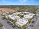 Drone image showcasing the community layout, ample parking, and lush tropical landscaping at 107 S Obrien St # 217, Tampa, FL 33609