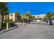 Siena Villas at Beach Park gated community entrance and parking area on a sunny day at 107 S Obrien St # 217, Tampa, FL 33609