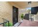 Stylish front door and entryway with black accents and fresh landscaping at 107 S Obrien St # 217, Tampa, FL 33609