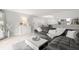 Contemporary living room features neutral tones, tile floors, and an open floor plan at 107 S Obrien St # 217, Tampa, FL 33609
