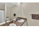 Bathroom with double sinks, granite countertop, large mirror, and shower/tub combination at 10864 Penny Gale Loop, San Antonio, FL 33576