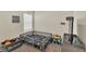 bedroom featuring a toddler bed, toys, and a mounted TV at 10864 Penny Gale Loop, San Antonio, FL 33576