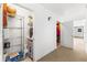 Hallway with shelving on the left and door on the right. Perfect place to store luggage or household goods at 1100 N Shore Ne Dr # 304, St Petersburg, FL 33701