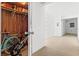 Spacious storage area featuring wood-paneled closet and bike, offering ample room for organization at 1100 N Shore Ne Dr # 304, St Petersburg, FL 33701