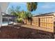 Private backyard with a screened-in pool area and wood fencing at 1100 Webb Dr, Clearwater, FL 33755
