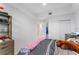 Well-lit bedroom with closet and light tiled floors at 125 Island Way # 404, Clearwater Beach, FL 33767