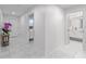 Bright hallway leading to bathroom and living room at 125 Island Way # 404, Clearwater Beach, FL 33767