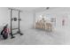 Open concept living room with view of kitchen and tile floors at 125 Island Way # 404, Clearwater Beach, FL 33767