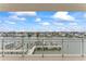 Scenic water view shows a canal with docks, boats, and waterfront homes in the distance at 125 Island Way # 404, Clearwater Beach, FL 33767