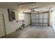 A clean and spacious 2-car garage with an automatic door and ample room for storage at 12607 Blackberry Row, Hudson, FL 34667