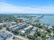 Expansive aerial view showcasing waterfront condos near the bridge and beautiful ocean views at 131 Bluff View Dr # 409, Belleair Bluffs, FL 33770
