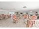 Community lounge area featuring a variety of comfortable wicker seating at 131 Bluff View Dr # 409, Belleair Bluffs, FL 33770