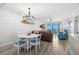 Bright living room featuring beach views, modern furnishings, and elegant lighting at 14900 Gulf Blvd # 304, Madeira Beach, FL 33708