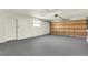 Spacious garage with automatic door and a window at 1510 Lakeside Dr, Dunedin, FL 34698