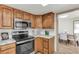 A modern kitchen showcases new appliances and marble countertops at 1510 Lakeside Dr, Dunedin, FL 34698